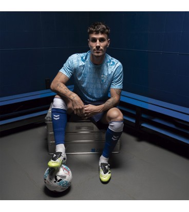 MALAGA CF OFFICIAL PREMATCH LETTERED T‑SHIRT 2025/26 –JUNIOR–