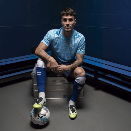 CAMISETA OFICIAL PREMATCH LETRAS MALAGA CF 2025/26 -INFANTIL-