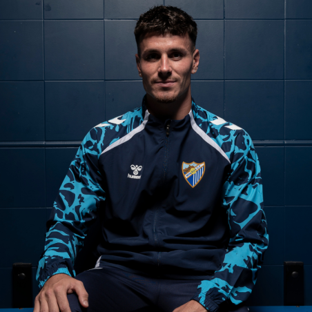 CHAQUETA OFICIAL PREMATCH MALAGA CF 2025/26